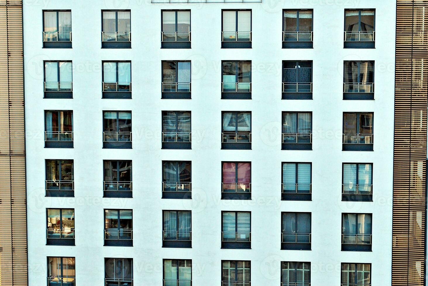 Modern and new apartment building. Multistoried, modern, new and stylish living block of flats. photo