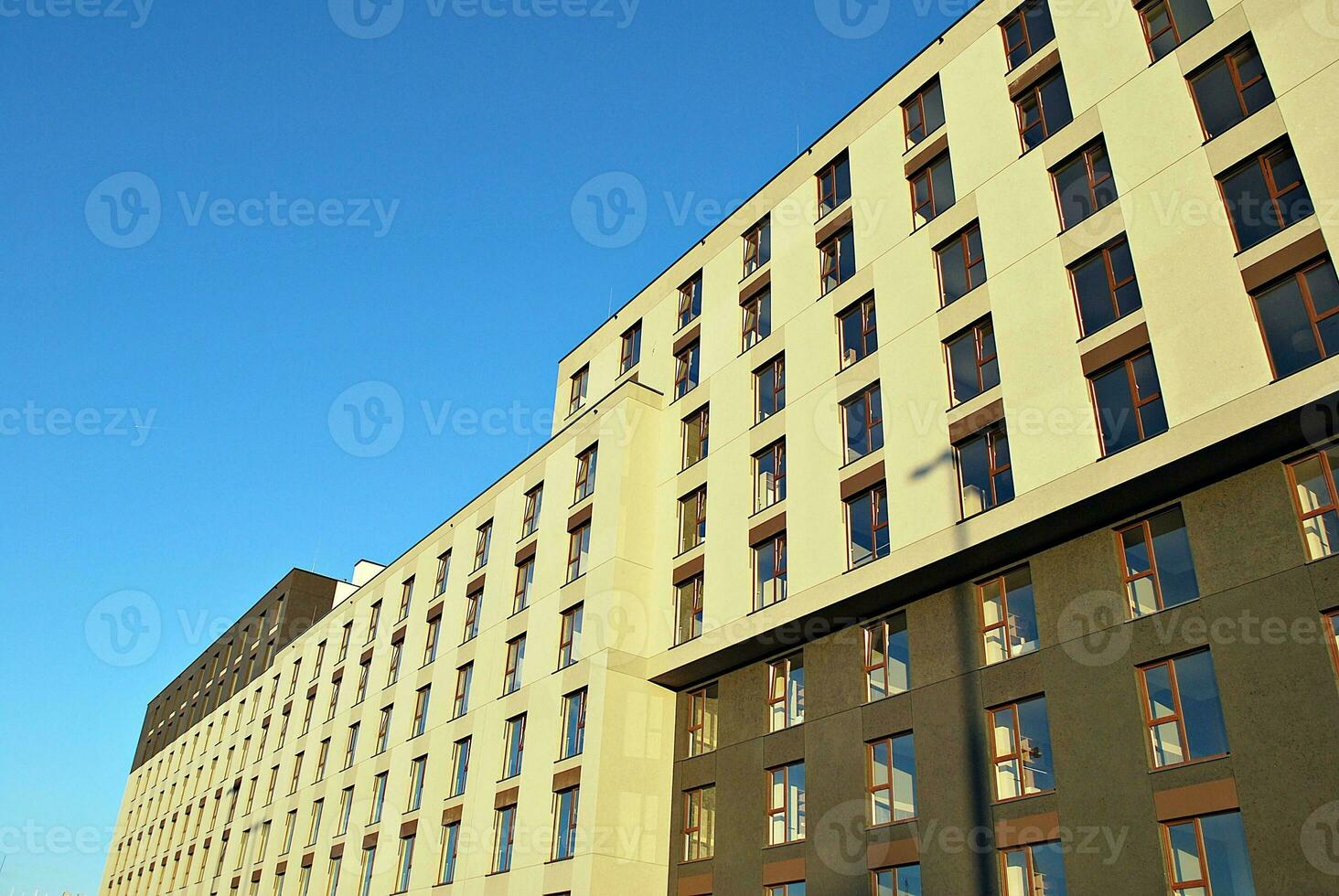 Modern and new apartment building. Multistoried, modern, new and stylish living block of flats. photo