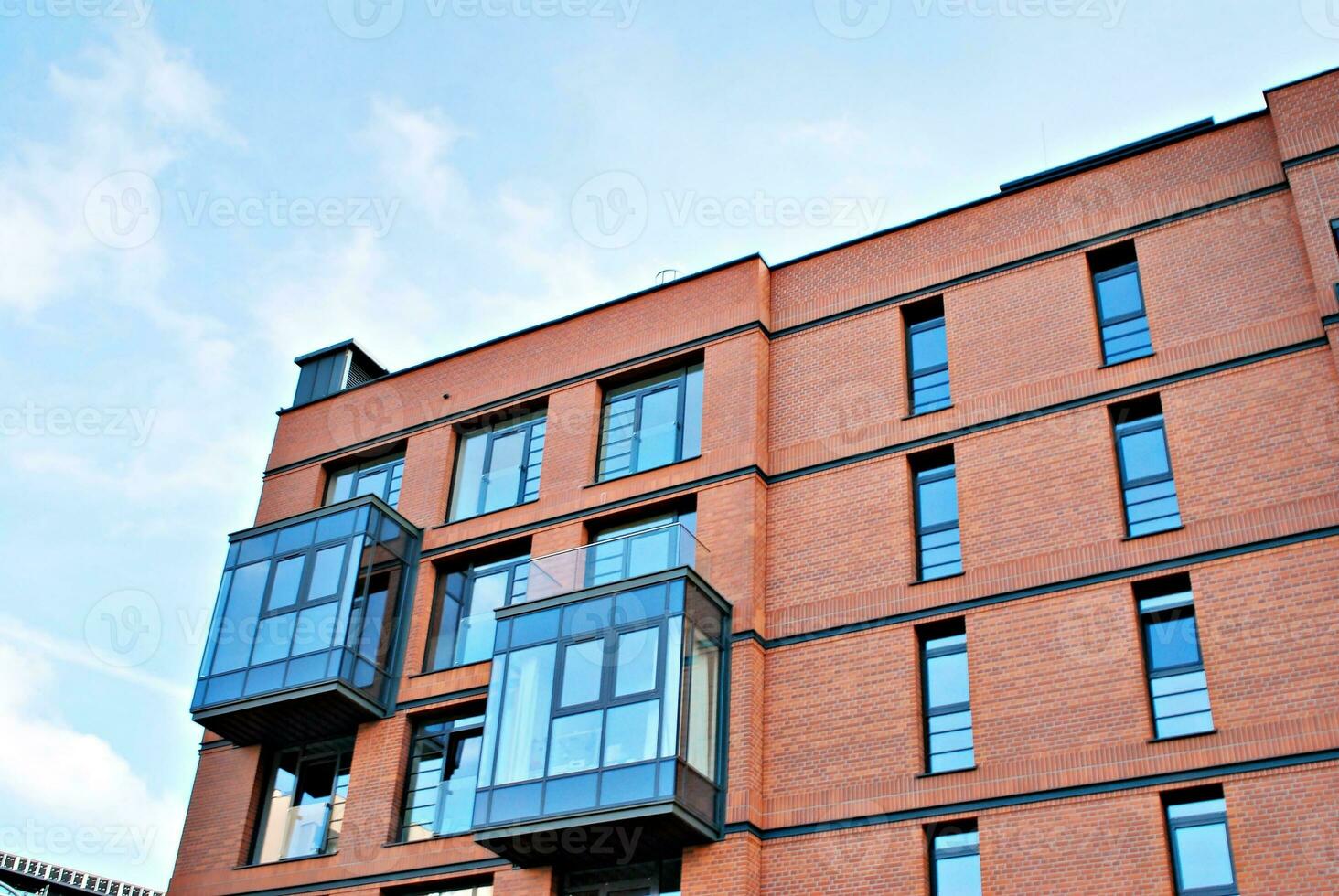 Modern and new apartment building. Multistoried, modern, new and stylish living block of flats. photo
