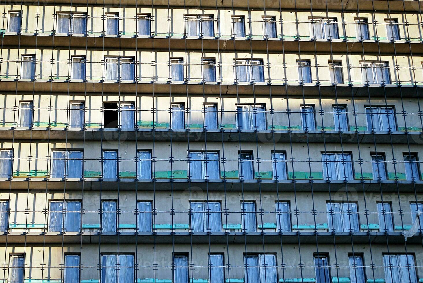 Modern and new apartment building. Multistoried, modern, new and stylish living block of flats. photo