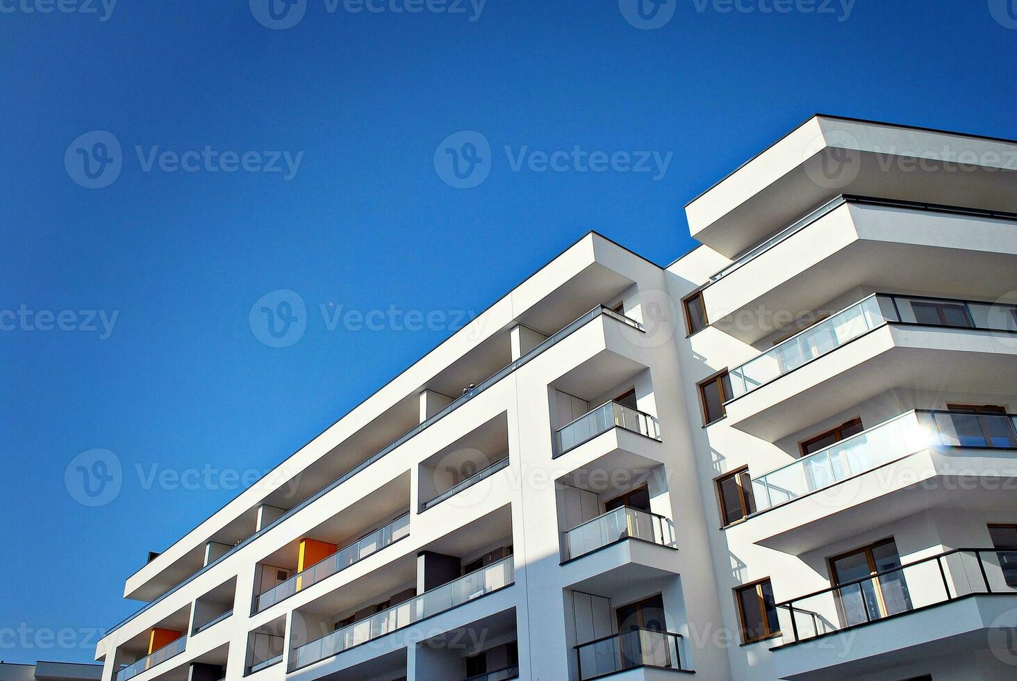Modern and new apartment building. Multistoried, modern, new and stylish living block of flats. photo