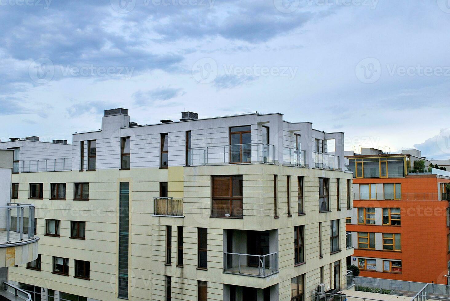 Modern and new apartment building. Multistoried, modern, new and stylish living block of flats. photo