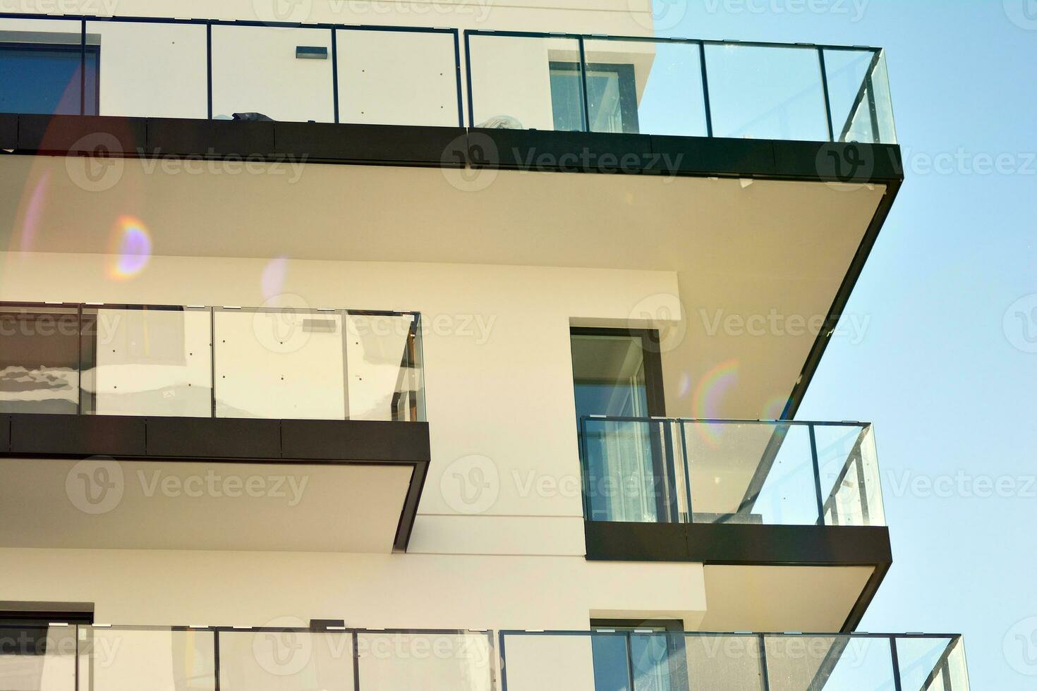 Modern and new apartment building. Multistoried, modern, new and stylish living block of flats. photo