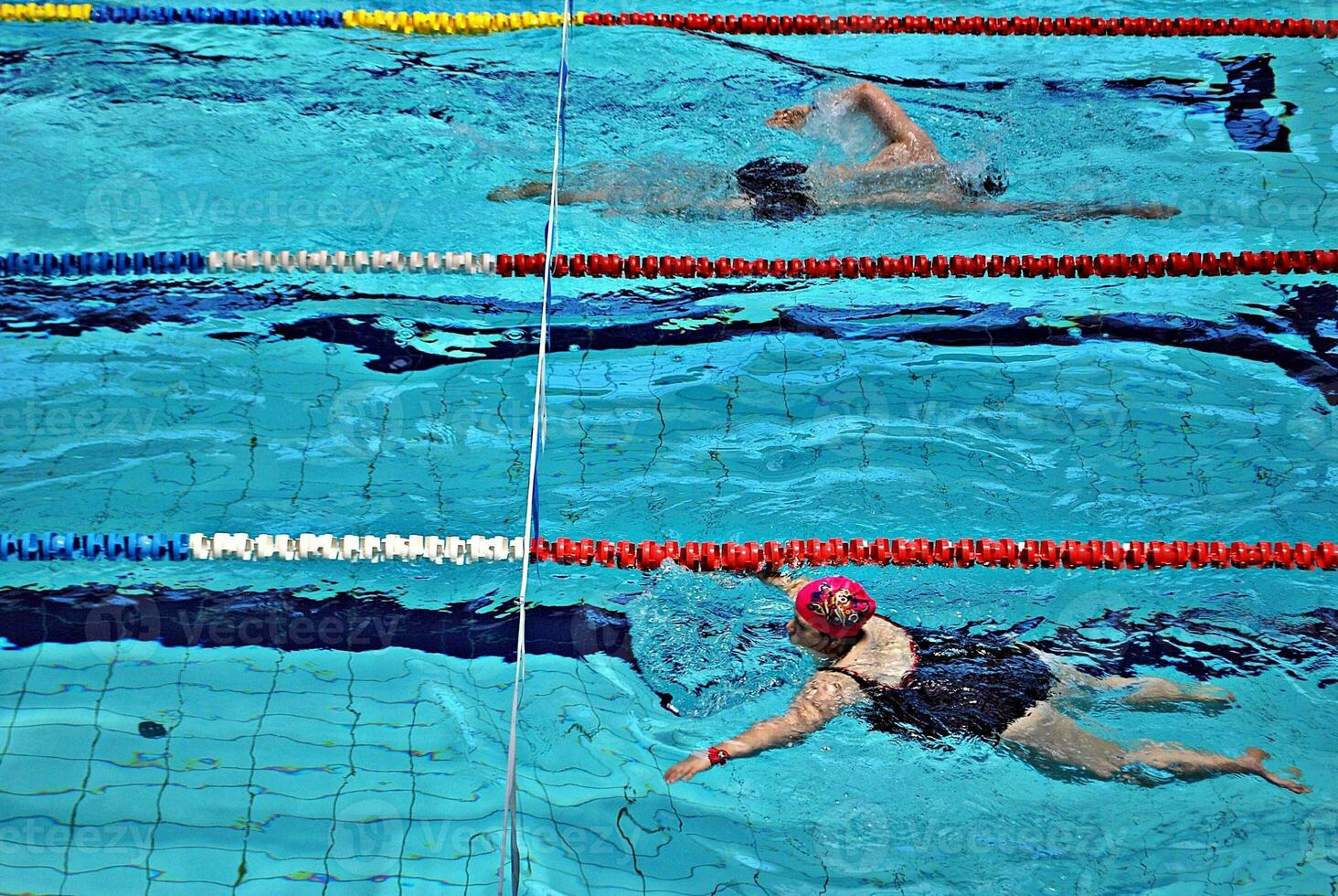 Swimming in the swimming pool photo