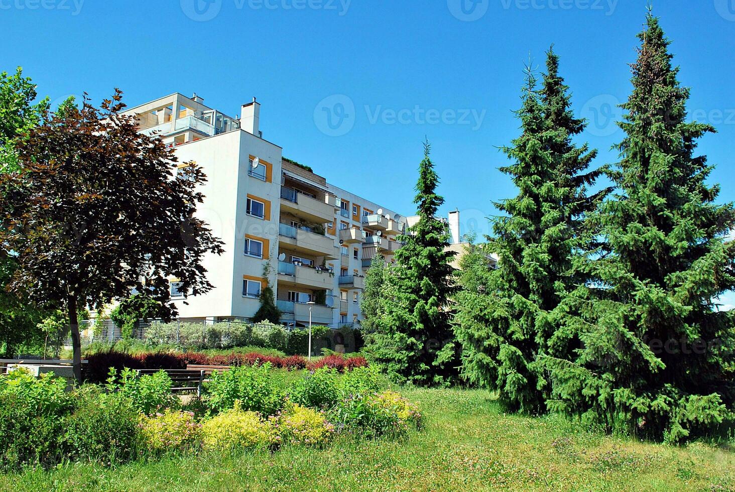 Modern and new apartment building. Multistoried, modern, new and stylish living block of flats. photo
