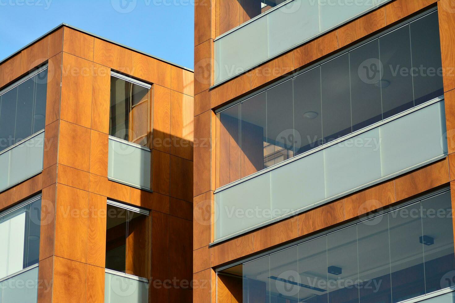 Modern and new apartment building. Multistoried, modern, new and stylish living block of flats. photo