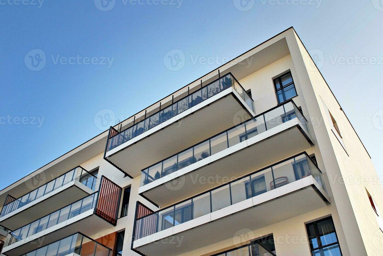 Modern and new apartment building. Multistoried, modern, new and stylish living block of flats. photo