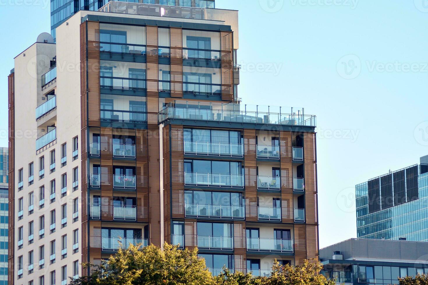 Modern and new apartment building. Multistoried, modern, new and stylish living block of flats. photo