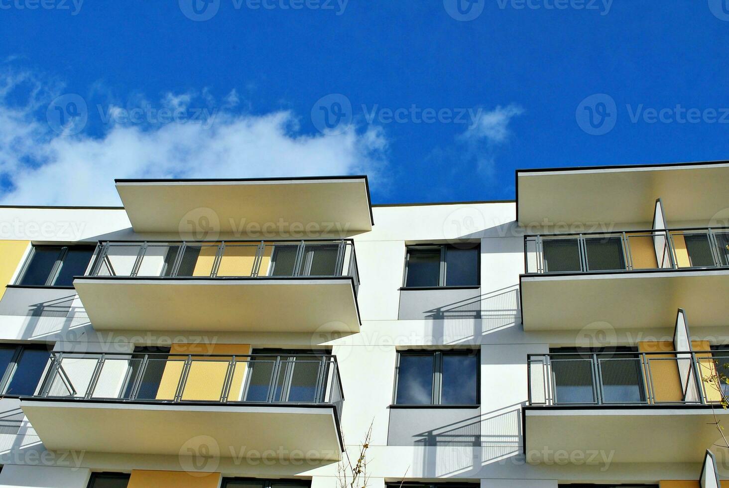 Modern and new apartment building. Multistoried, modern, new and stylish living block of flats. photo