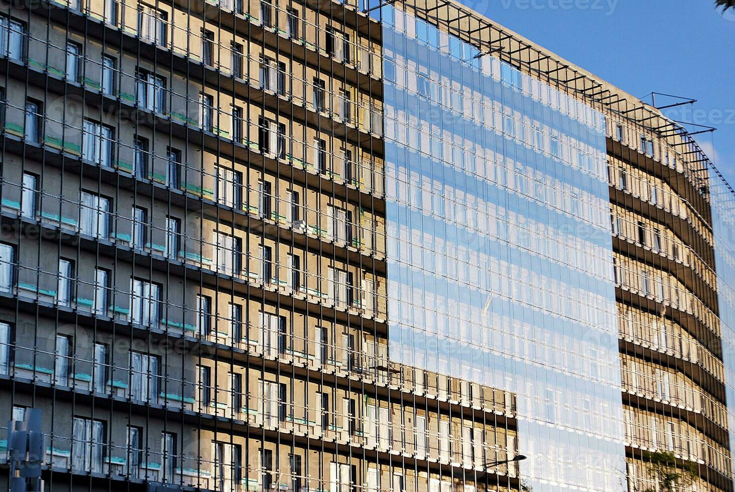 Modern and new apartment building. Multistoried, modern, new and stylish living block of flats. photo