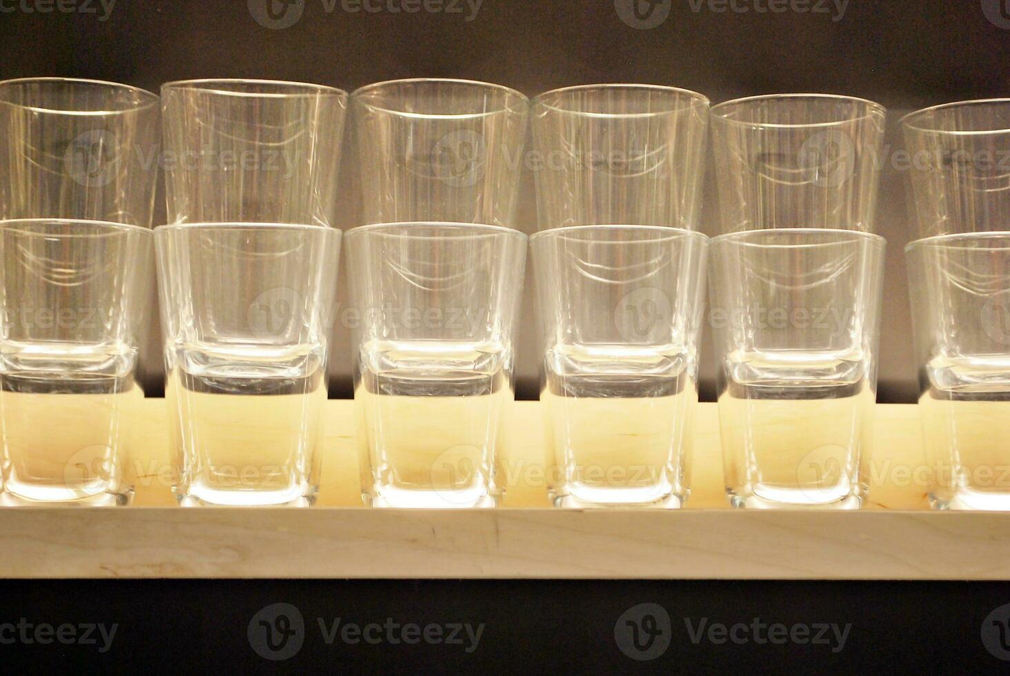 Crystal wine glasses on the table photo