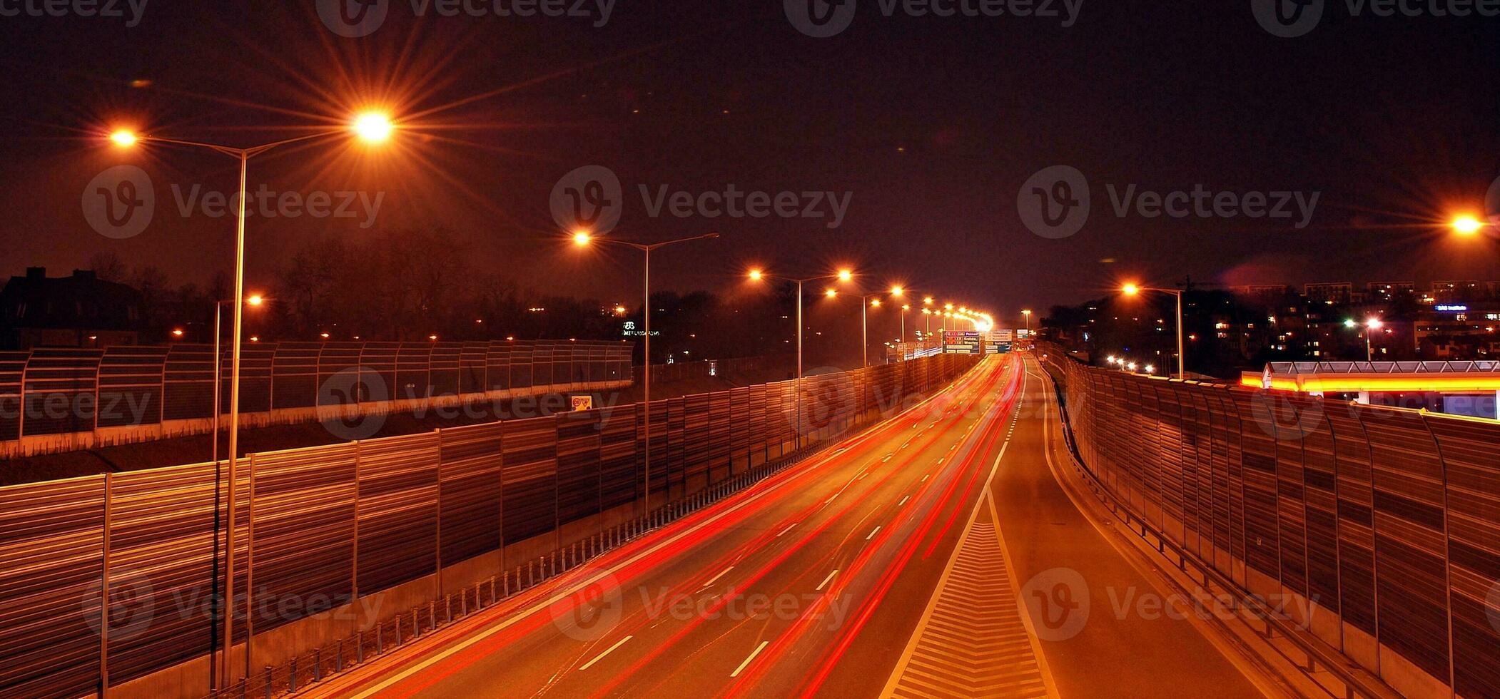 Light streaks and traces of movement in the city photo