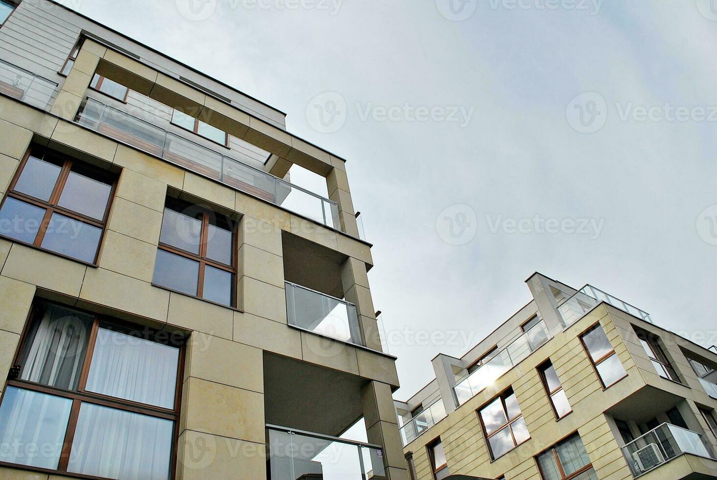 Modern and new apartment building. Multistoried, modern, new and stylish living block of flats. photo
