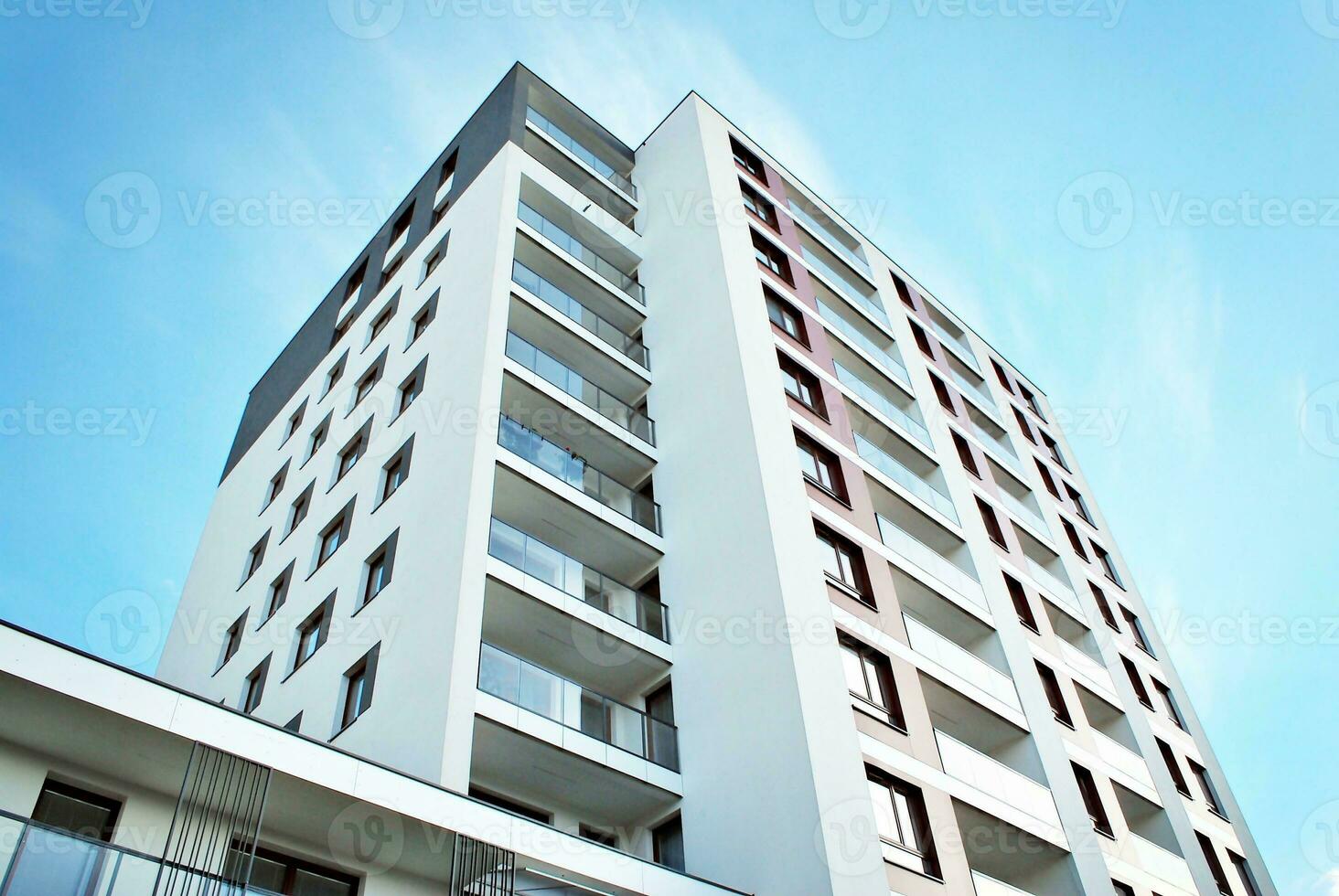 Modern and new apartment building. Multistoried, modern, new and stylish living block of flats. photo