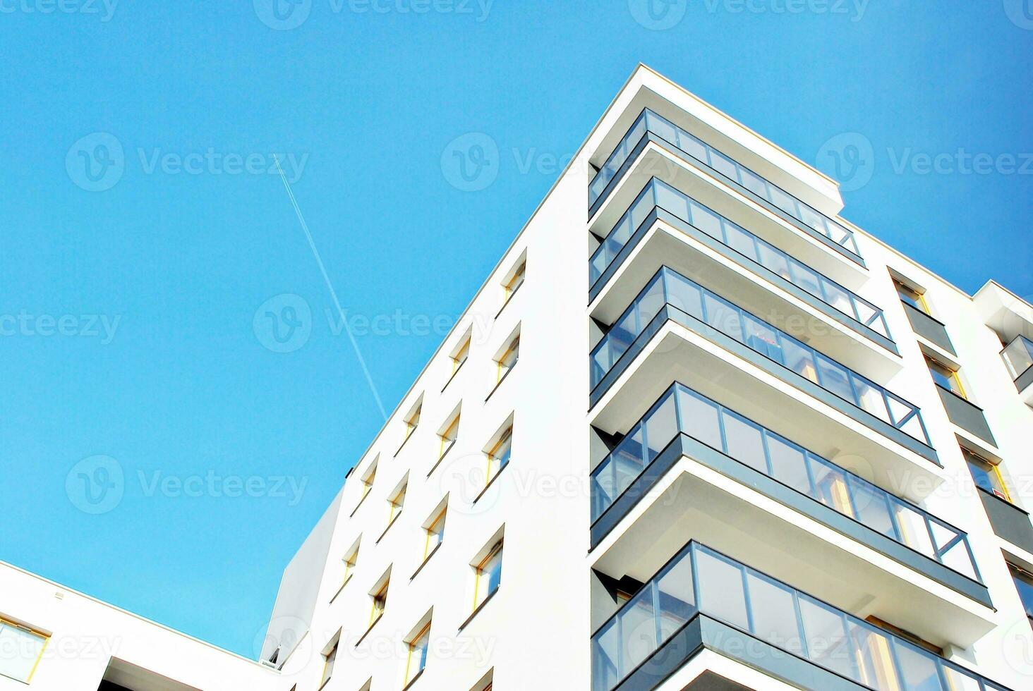 Modern and new apartment building. Multistoried, modern, new and stylish living block of flats. photo