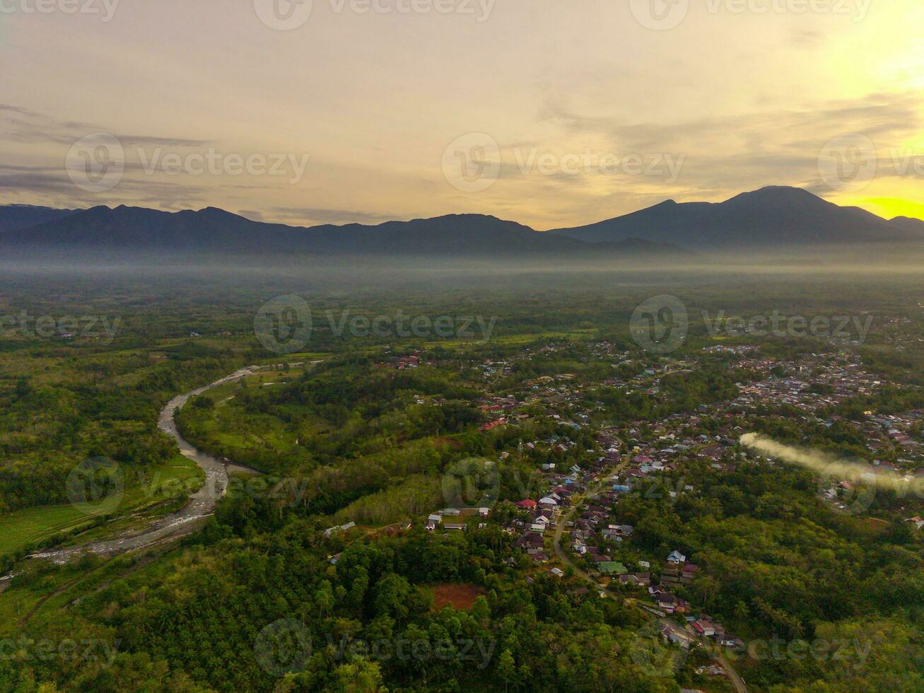 the beauty of the morning panorama with sunrise in indonesia village photo