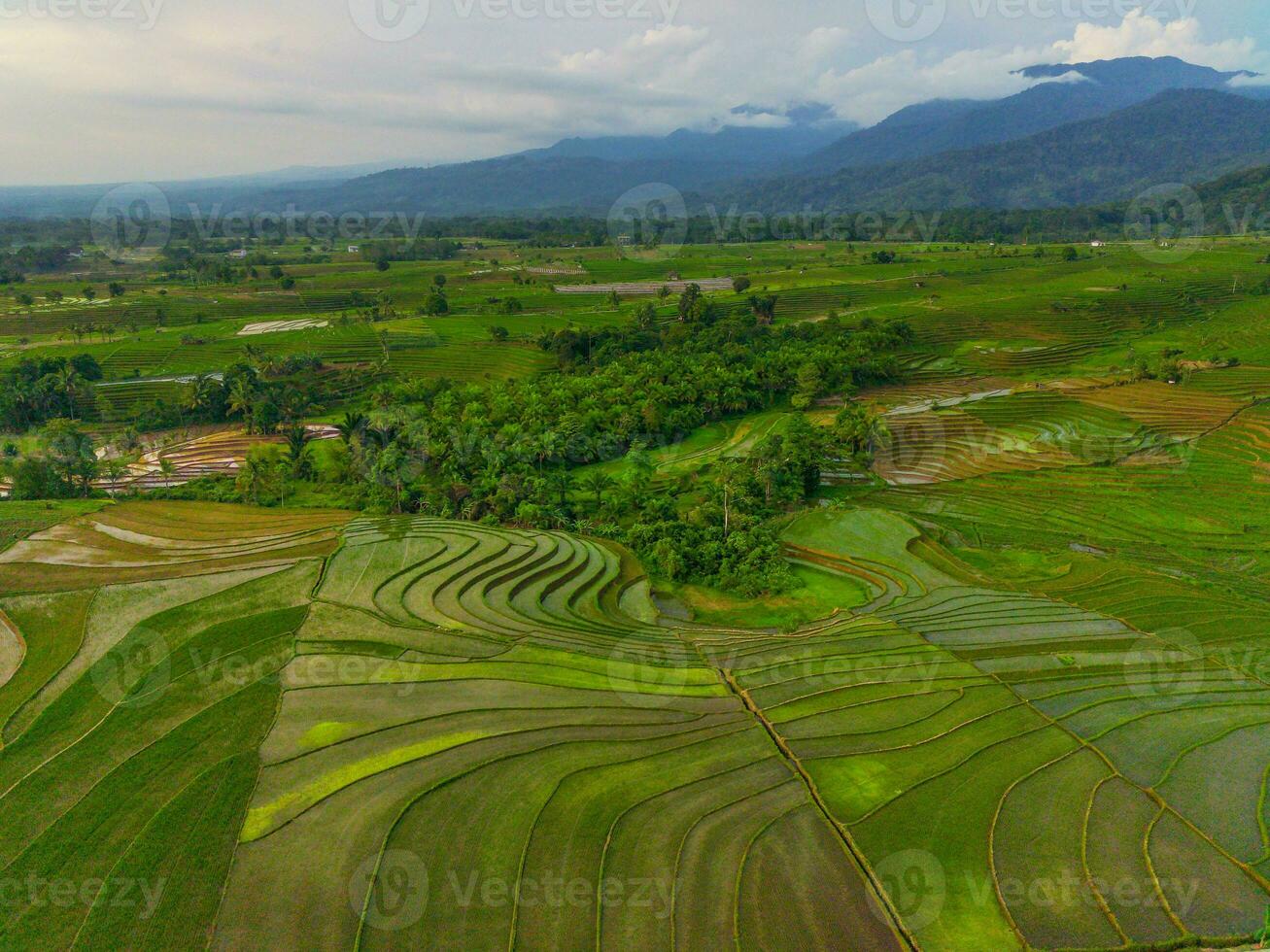 the beauty of the morning panorama with sunrise in indonesia village photo