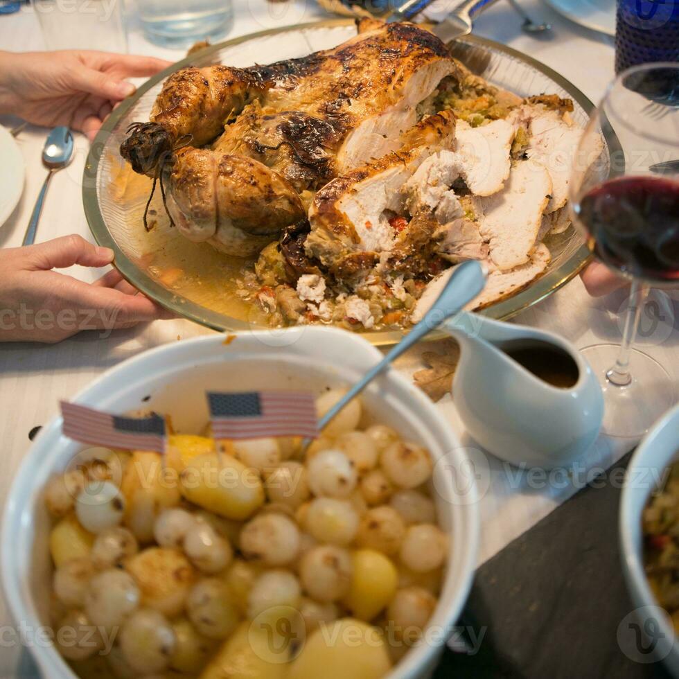 Close up of christmas table with turkey and side photo
