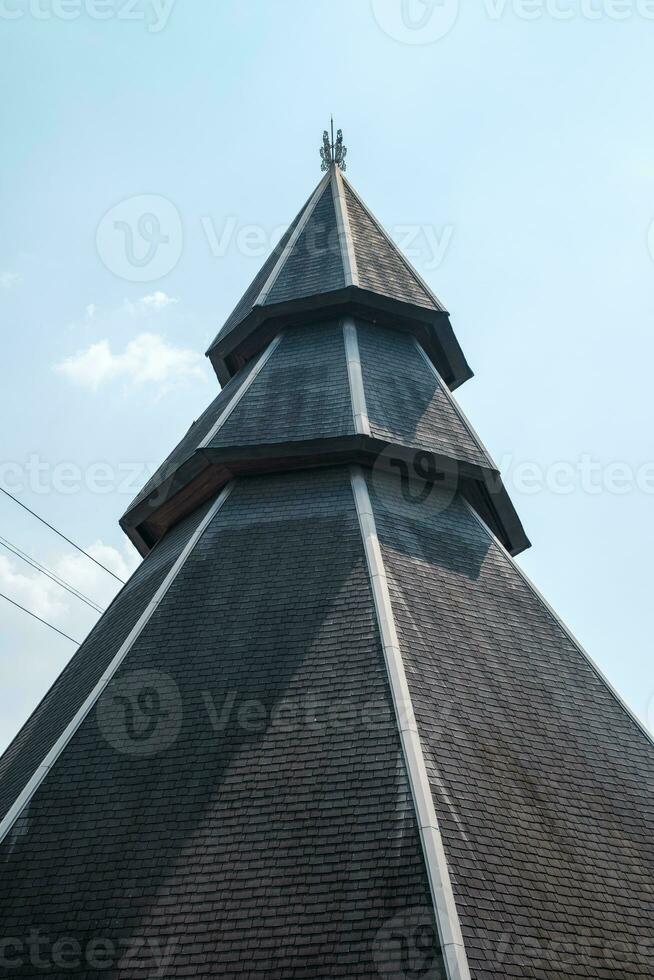 Symmetrical Roof Peak of Building photo