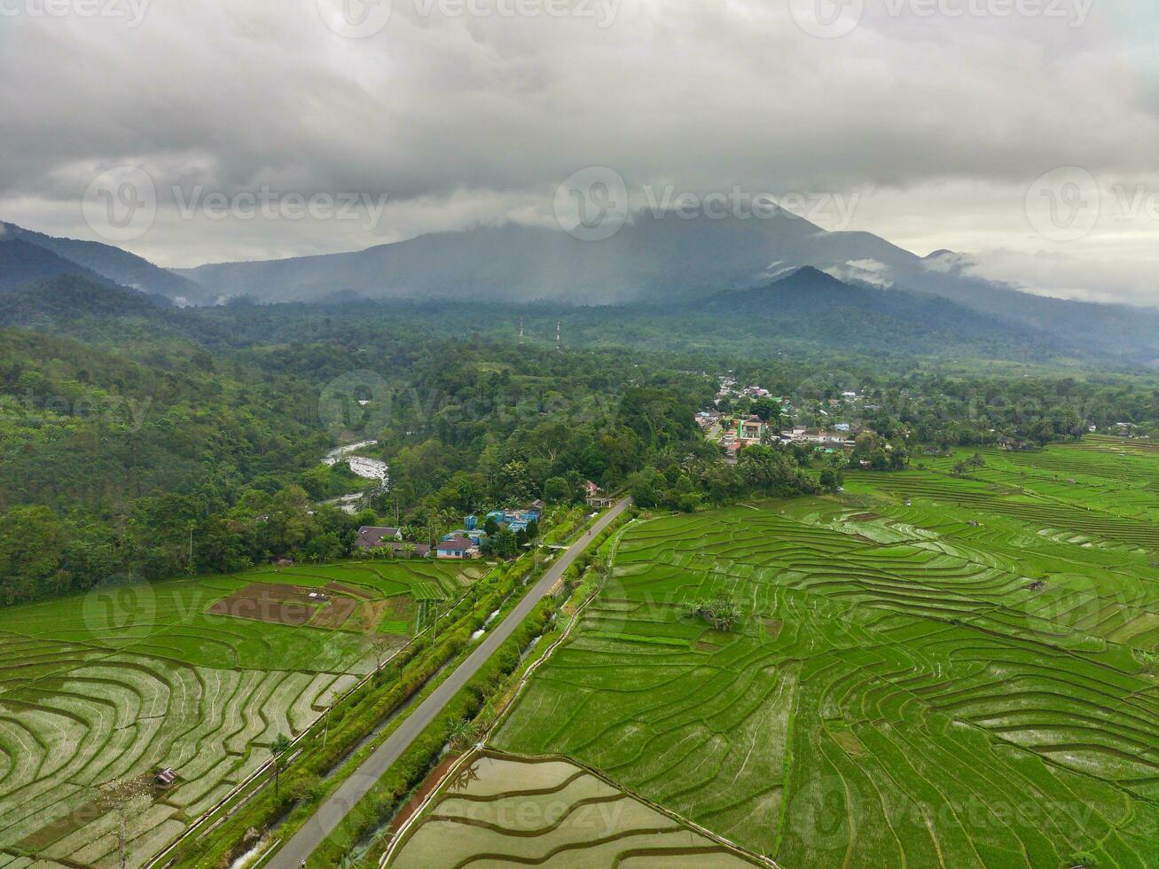 the beauty of the morning panorama with sunrise in indonesia village photo