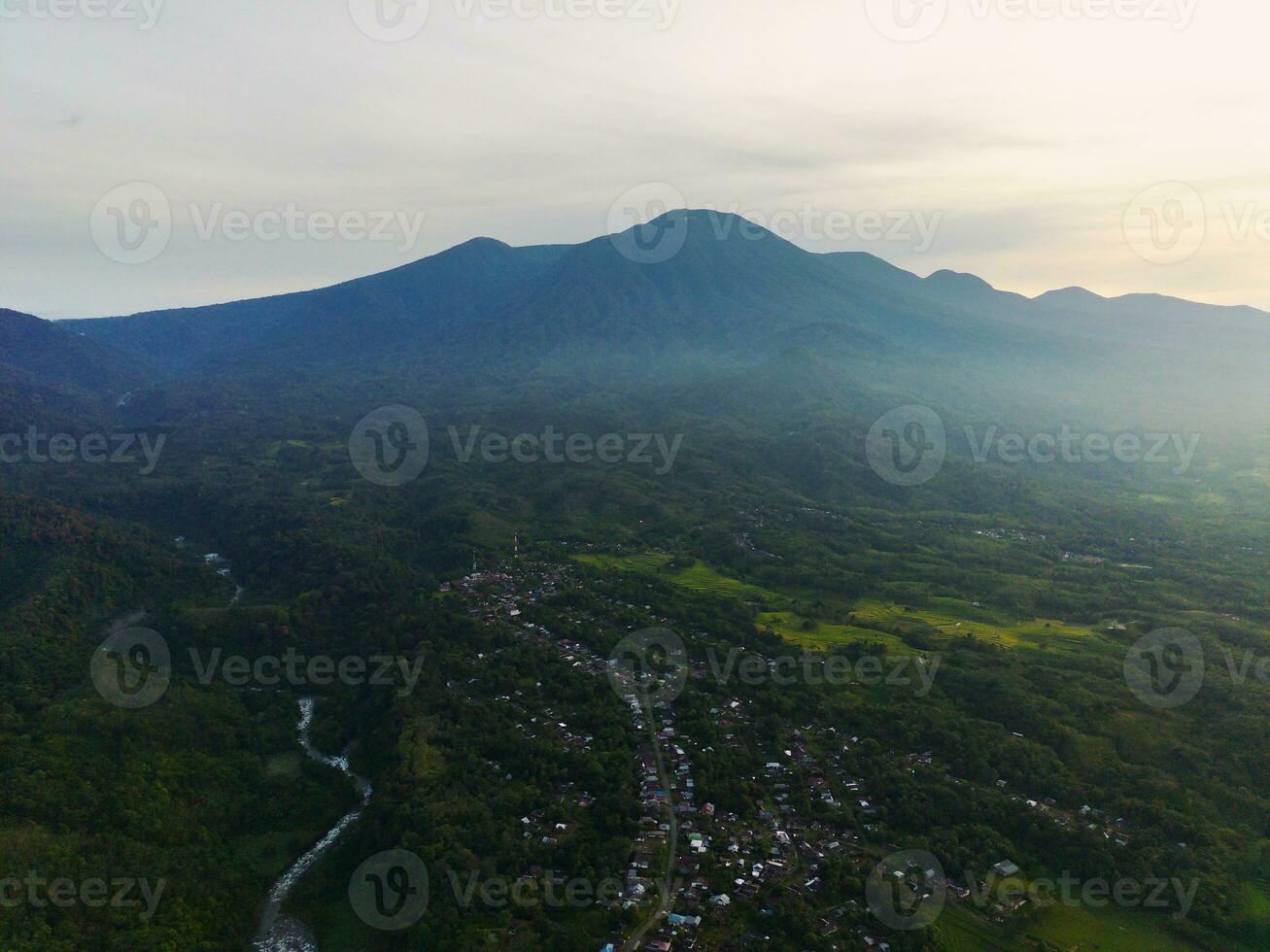 the beauty of the morning panorama with sunrise in indonesia village photo