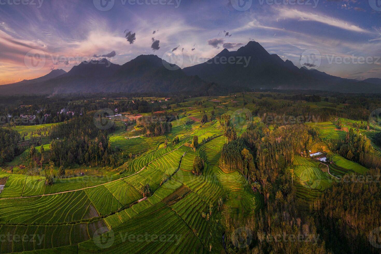 the beauty of the morning panorama with sunrise in indonesia village photo