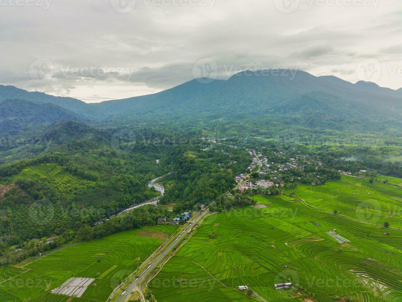 the beauty of the morning panorama with sunrise in indonesia village photo