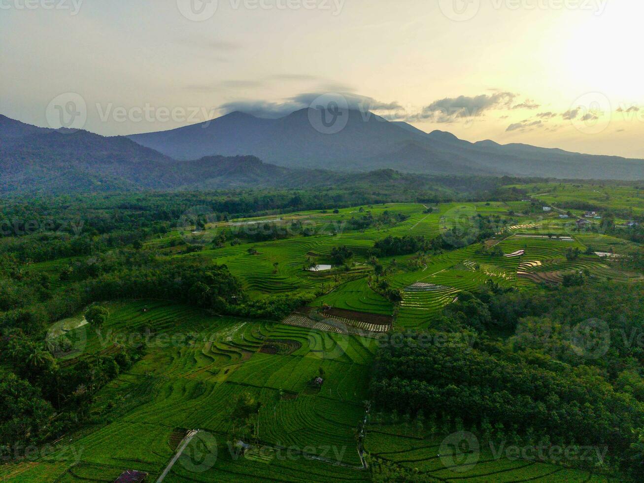 the beauty of the morning panorama with sunrise in indonesia village photo