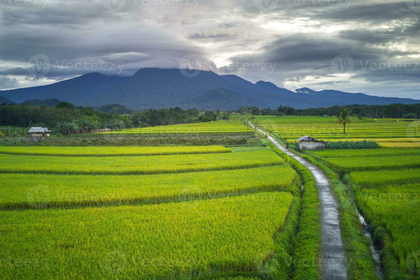 the beauty of the morning panorama with sunrise in indonesia village photo