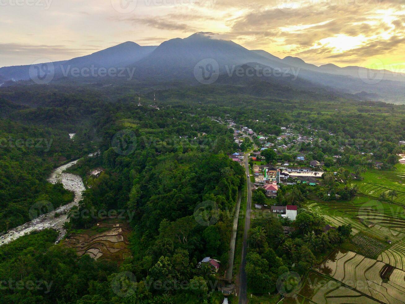 the beauty of the morning panorama with sunrise in indonesia village photo