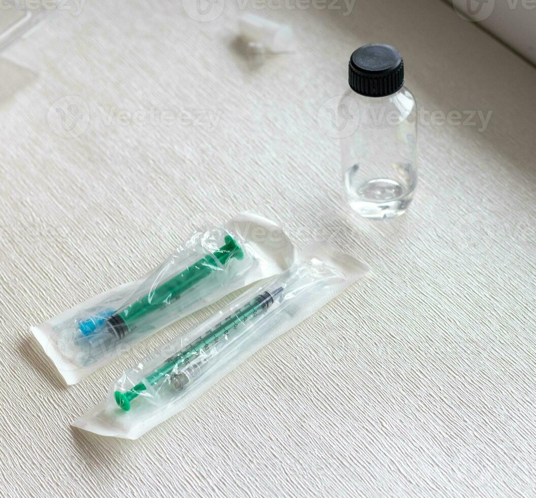Shot of the syringes and medicine prepared for injection. Healthcare photo
