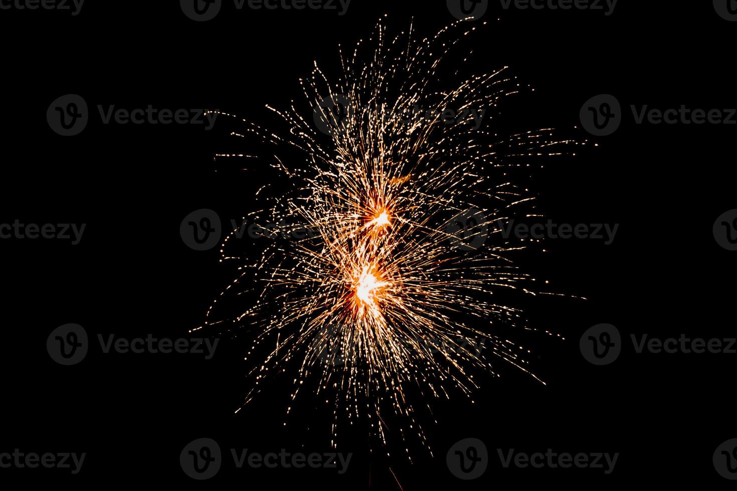 Fireworks in the skyDual Fireworks Illuminate Night Sky photo
