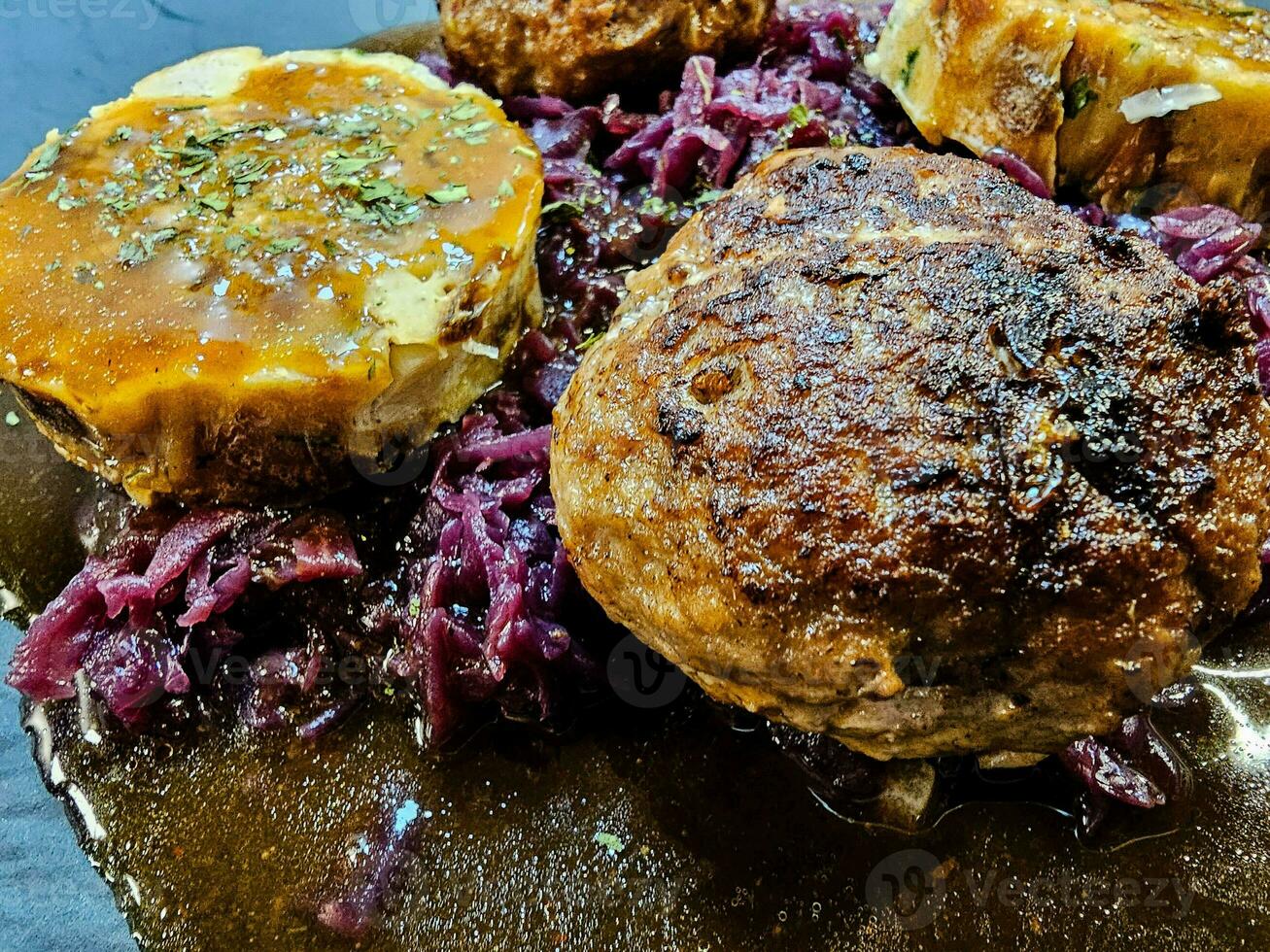 Fried meatballs with cabbage and parsley potatoes photo