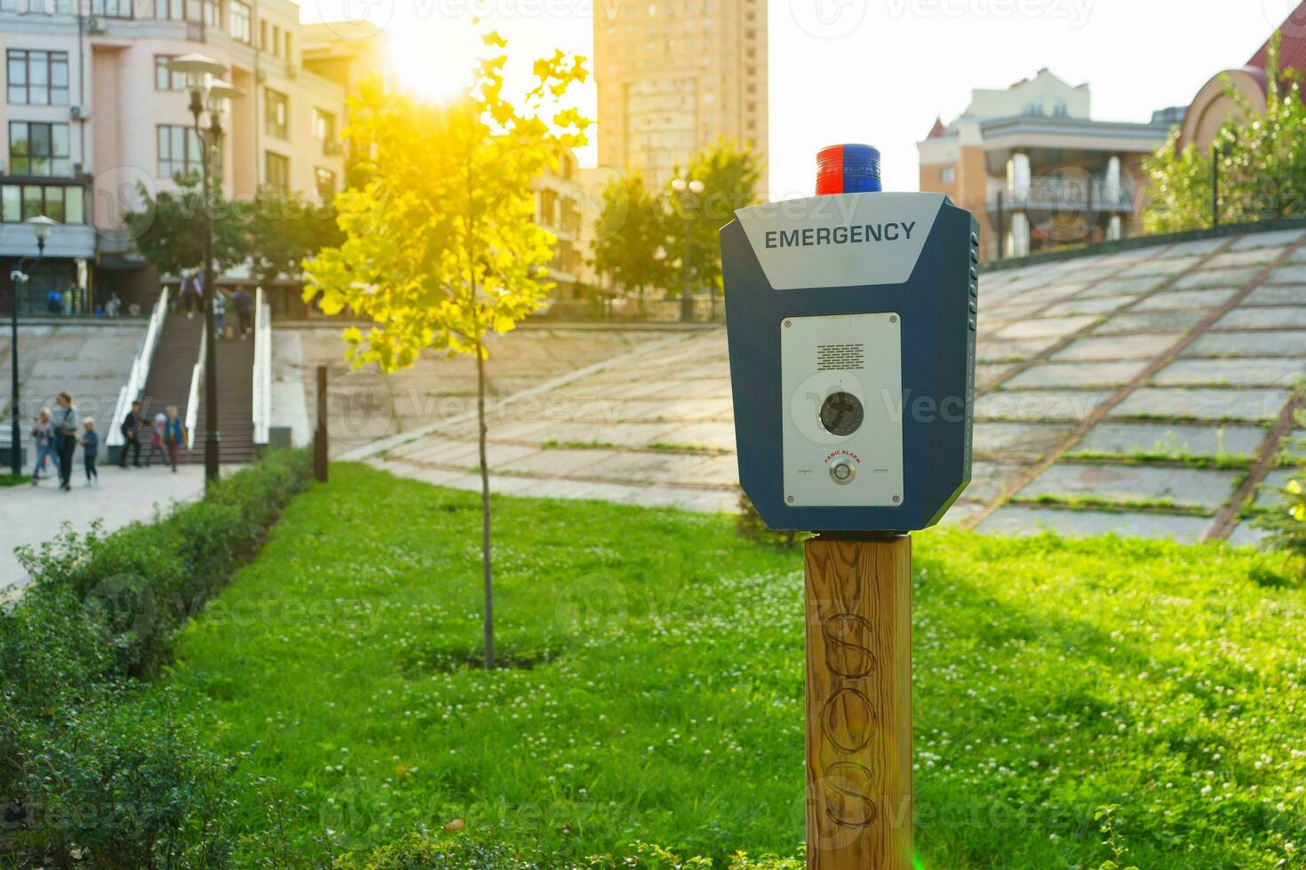 Panic alarm, police, emergency button in the public park. photo