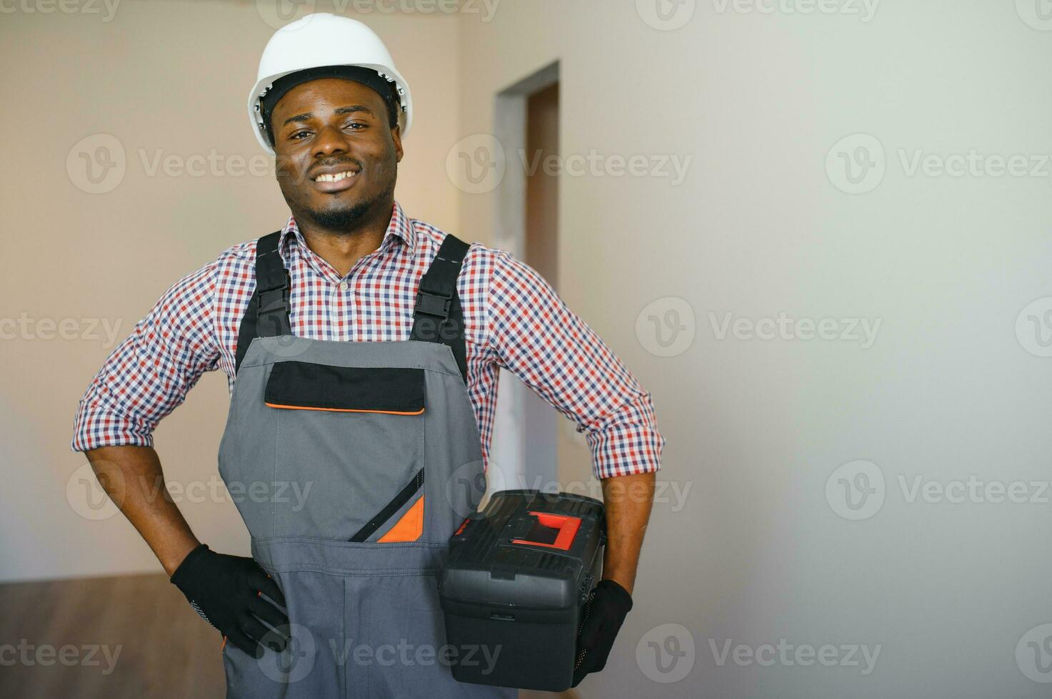 portrait of an African American construction worker on location photo