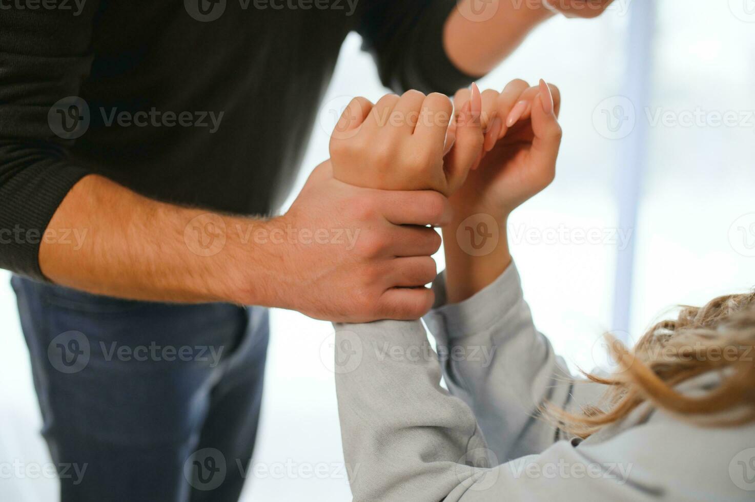 Angry husband beats his wife, domestic violence photo