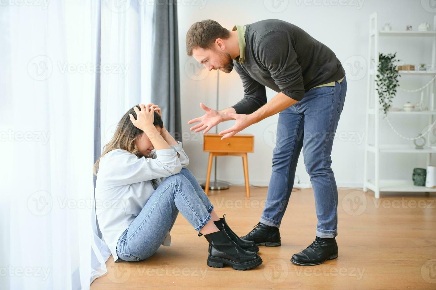 Man beating up his wife illustrating domestic violence photo