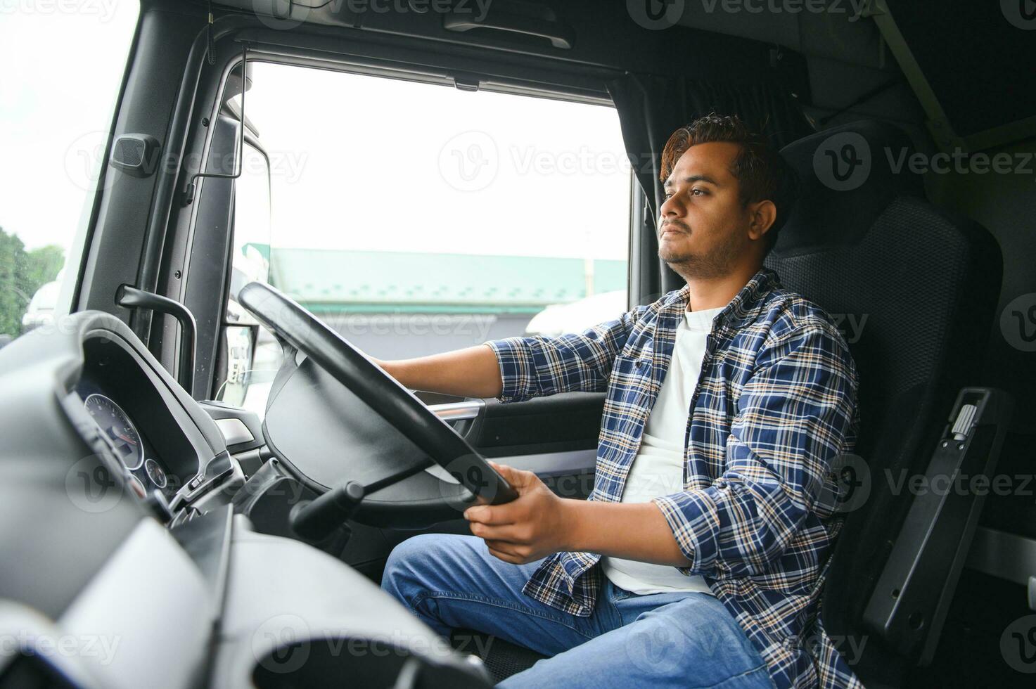 Portrait of a indian truck driver photo