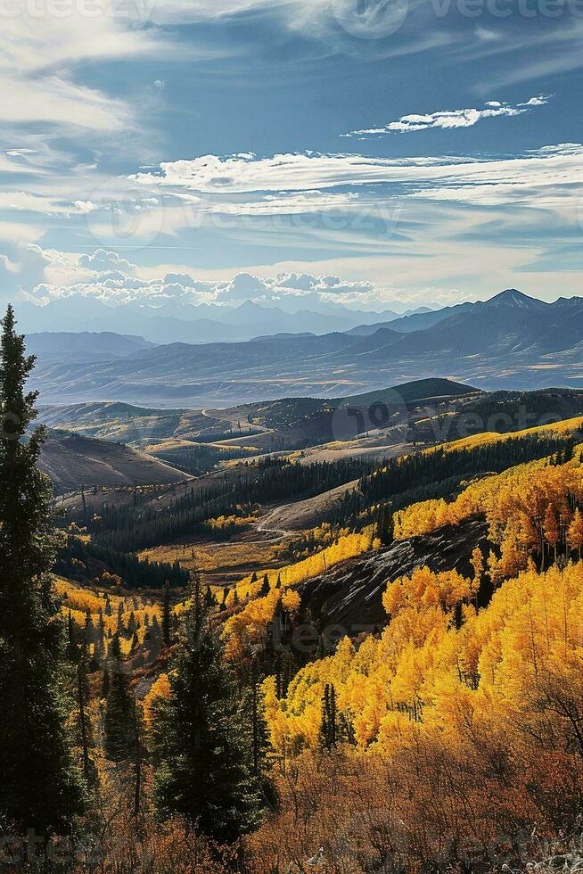 AI generated A scenic view capturing golden autumn foliage, rolling terrains, distant majestic mountains and a beautifully patterned sky. photo