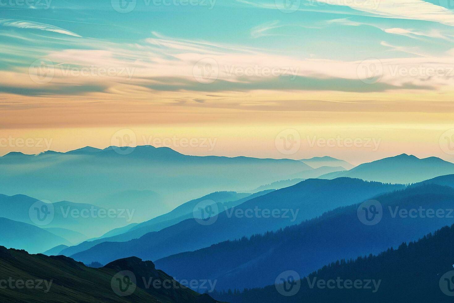 AI generated A breathtaking sunset illuminating the misty mountain ranges, showcasing a dance of colors in the sky and casting serene silhouettes. photo