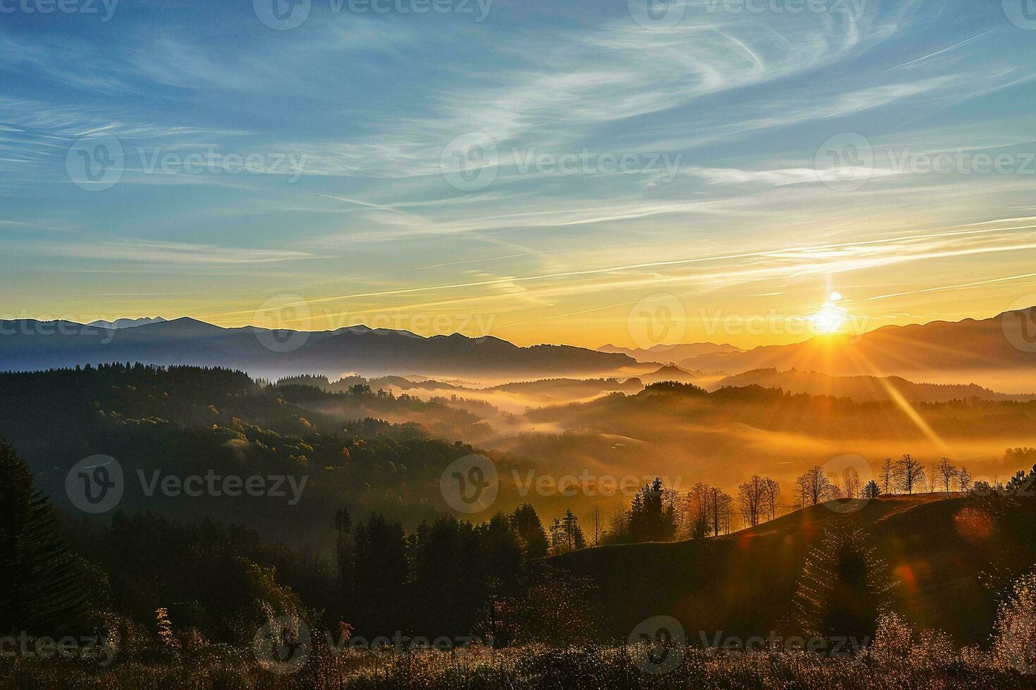 AI generated A breathtaking sunrise illuminates the misty valleys, highlighting the lush green forests and serene mountains photo