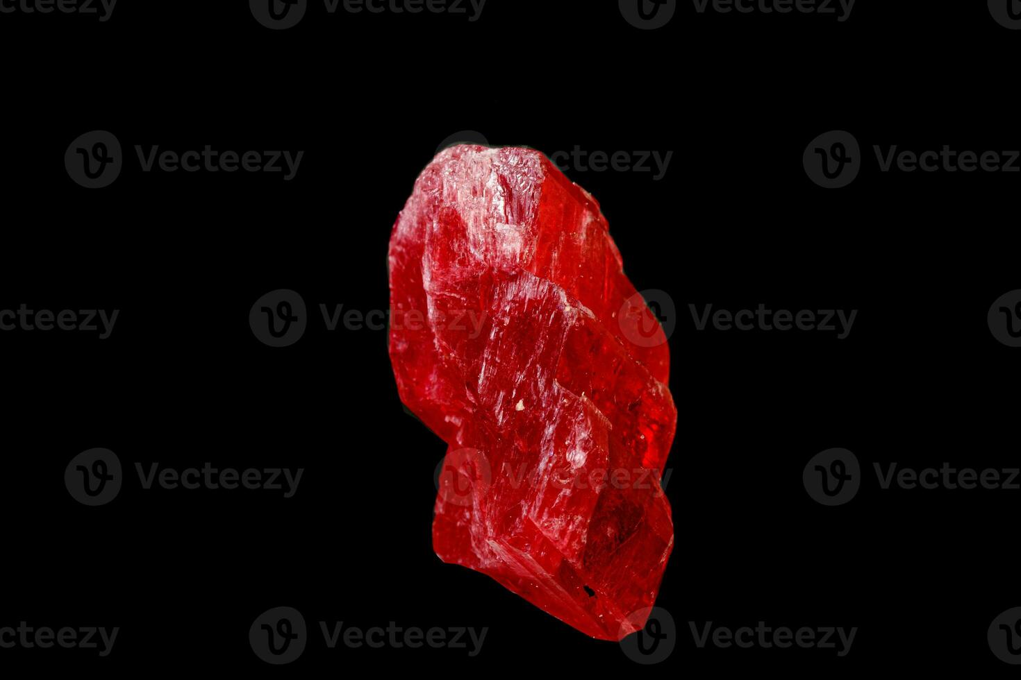 macro mineral stone Rhodochrosite on a black background photo