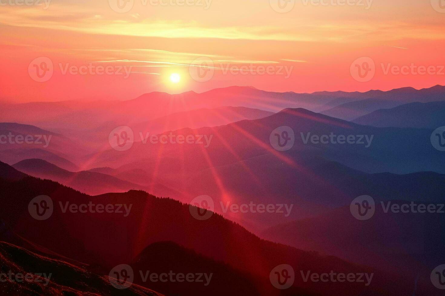 AI generated A stunning sunrise illuminating a mountain range with vibrant hues of red and orange, casting dramatic sunbeams and shadows photo