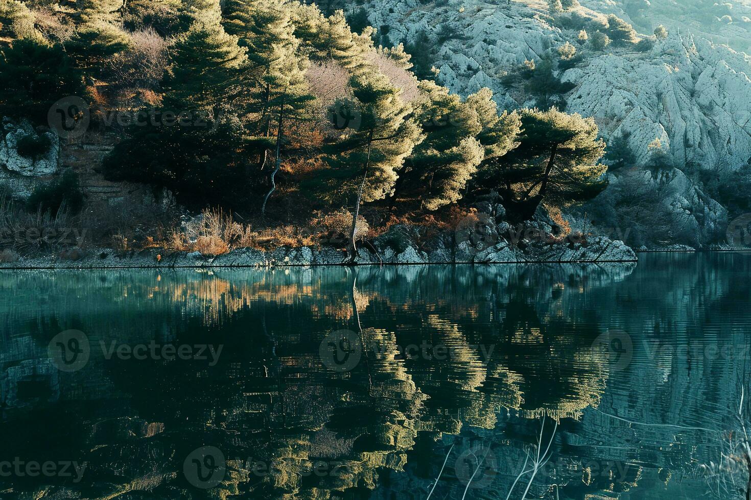 AI generated a serene lake surrounded by lush green trees and rocky terrain. The water in the lake is calm and clear, reflecting the surrounding landscape perfectly. photo