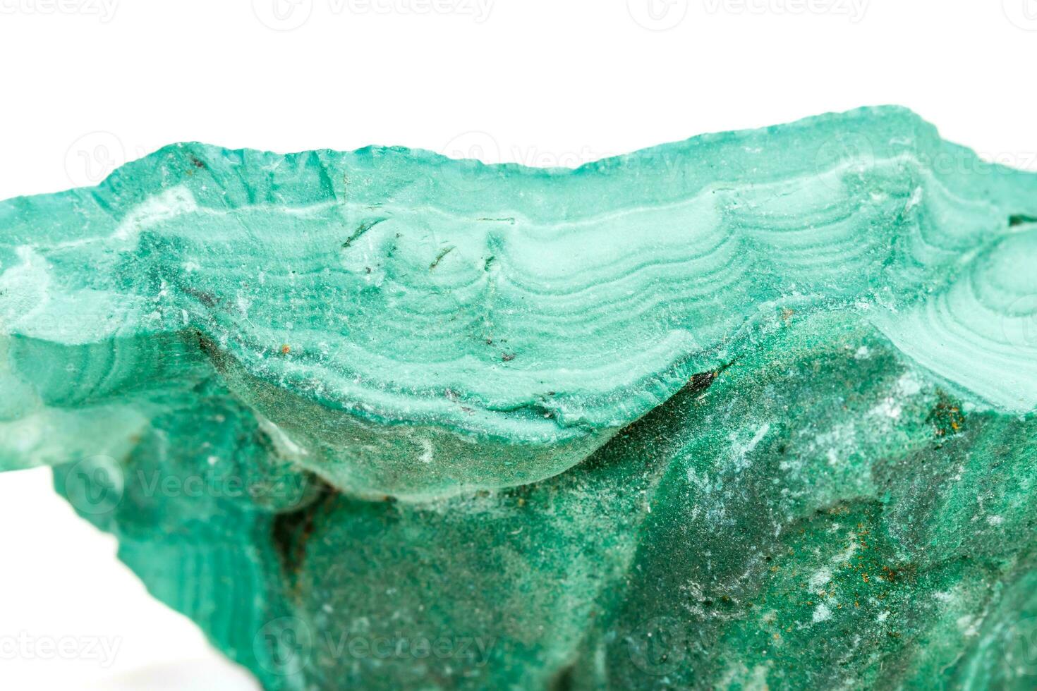 Macro mineral stone Malachite in the rock on a white background photo