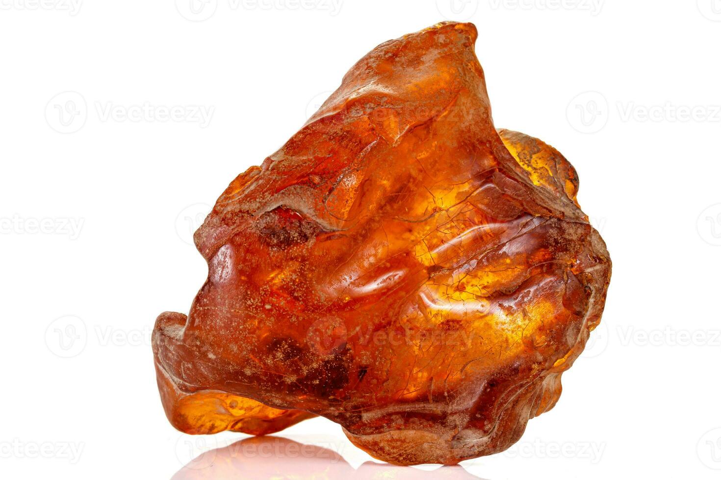 Macro stone amber mineral on white background photo