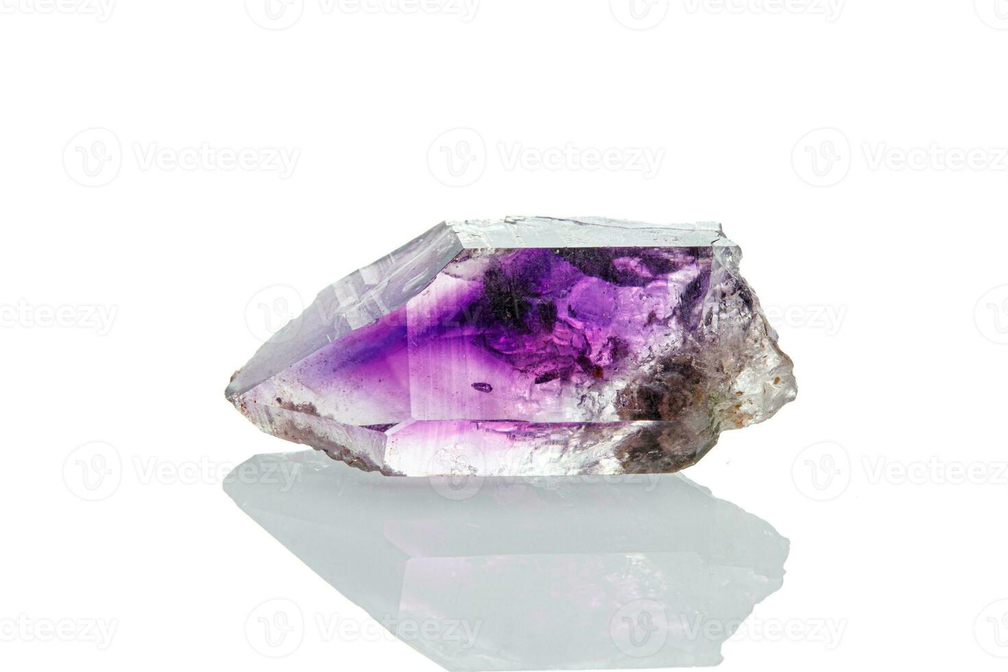 macro mineral stone amethyst on a white background photo