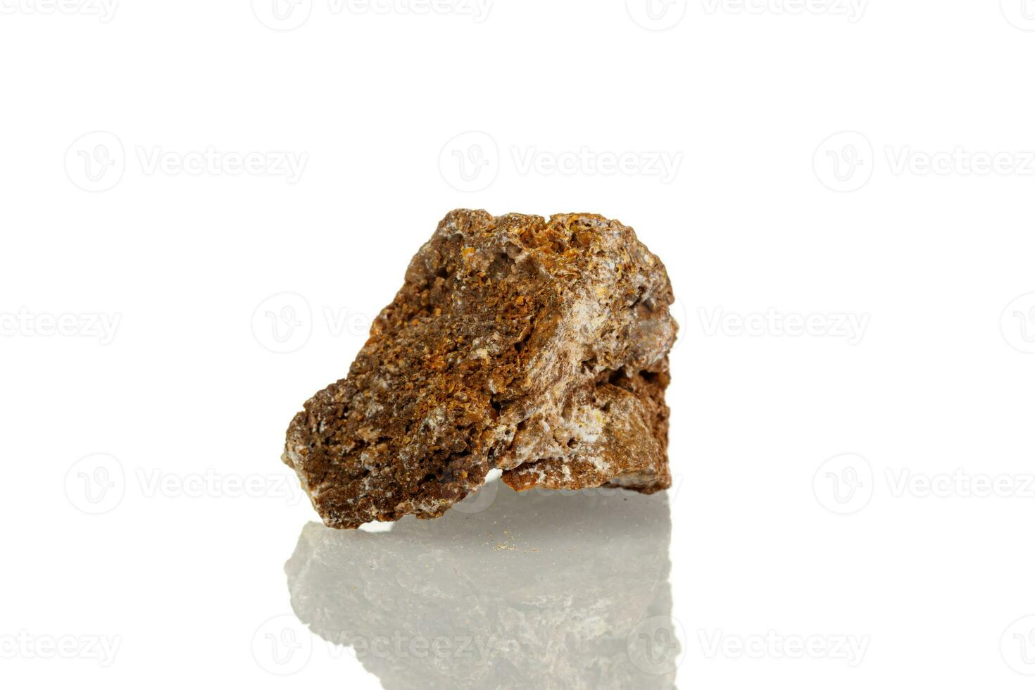 macro mineral stone Wulfenite on a white background photo