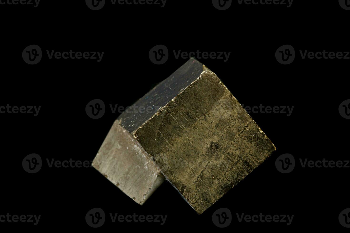 macro mineral pyrite stone on a black background photo