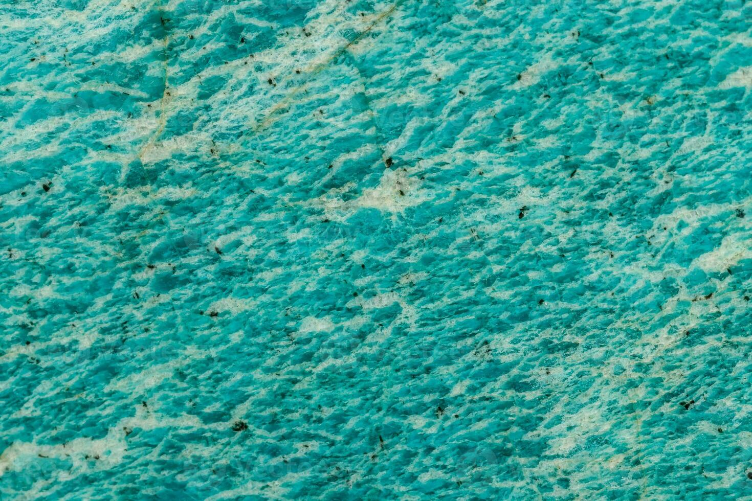 Macro of mineral stone amazonite on a black background photo
